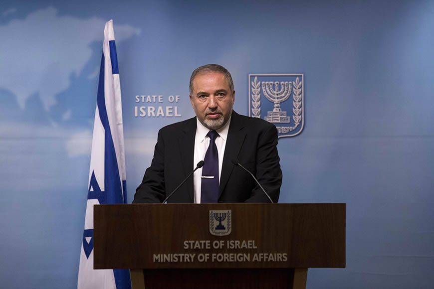 epa04511792 Israeli Foreign Minister Avigdor Lieberman speaks as he address the upcoming early elections during a press conference at the Israeli Foreign Ministry in Jerusalem, Israel, 02 December 2014. Israel appears headed toward an early election after Prime Minister Benjamin Netanyahu and a key coalition partner failed to bridge differences on the budget and a Jewish nation state proposal, The Jerusalem Post reported. EPA/ABIR SULTAN