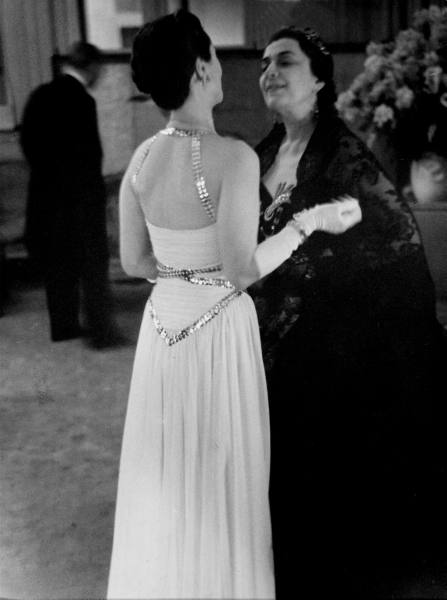 Duchess of Windsor (C) talking with Marthe Lahovary (Princess Bibesco) during a ball given at the US Embassy. Location:Paris, France Date taken: February 1939 Photographer:Kitrosser LIFE