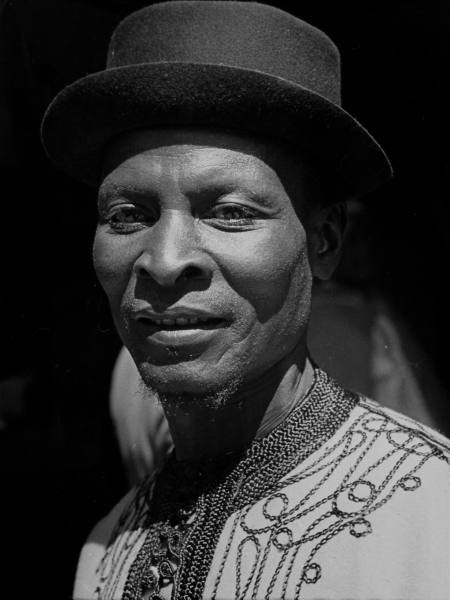 African chief Samba Taraore of French Sudan arriving in France for Bastille Day celebrations. Location:Bordeaux, France Date taken: 1939 Photographer:Kitrosser